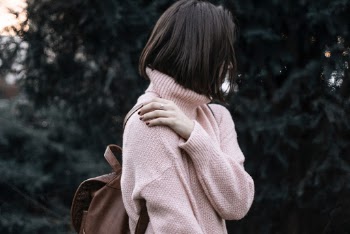 Woman Wearing Pink Turtleneck Sweater