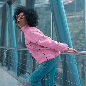 Woman Wearing Pink Windbreaker