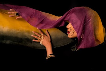 Woman Wearing Purple and Yellow Hijab