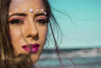 Woman Wearing Purple Lipstick