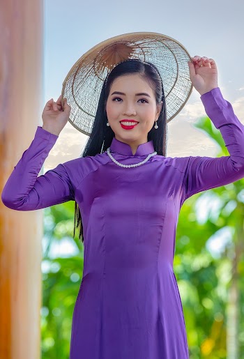 Woman Wearing Purple Long Sleeved Dress