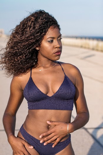 Woman Wearing Purple Swimsuit