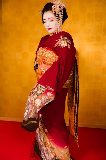 Woman Wearing Red And Gold Kimono