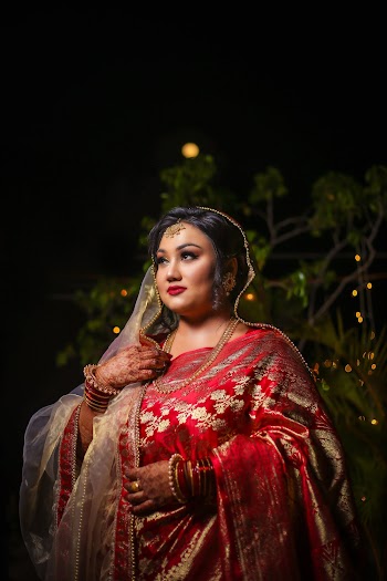 Woman Wearing Red and Gold Sari Dress