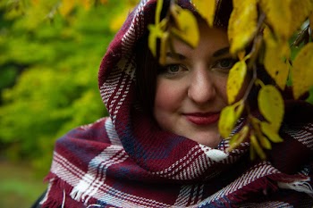 Woman Wearing Red and White Plaid Headscarf