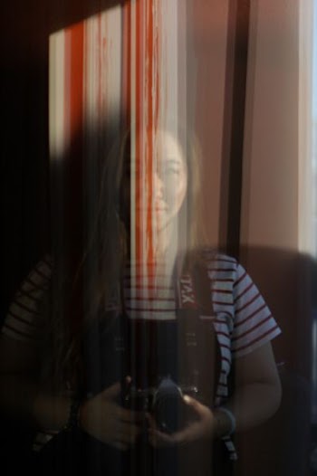 woman wearing red and white striped T-shirt