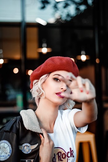 Woman Wearing Red Baret