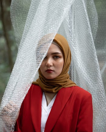 Woman Wearing Red Blazer And Hijab