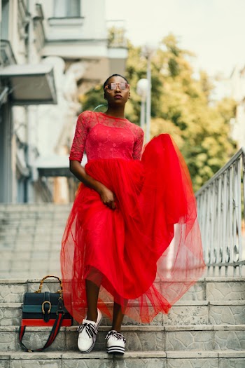 Woman Wearing Red Crew-neck Dress Walking on the Stairs Photography