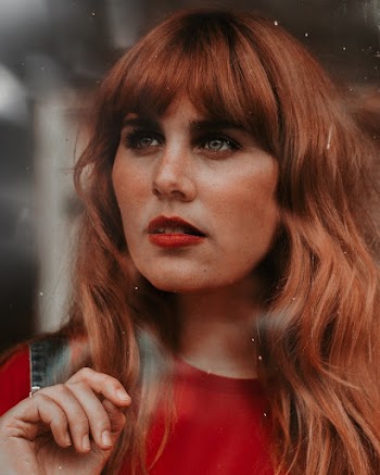 Woman Wearing Red Crew-neck Top
