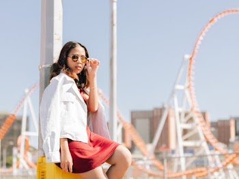 Woman Wearing Red Dress With White Jacket