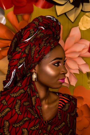 Woman Wearing Red Floral Headdress