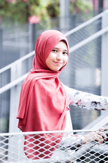 Woman Wearing Red Hijab