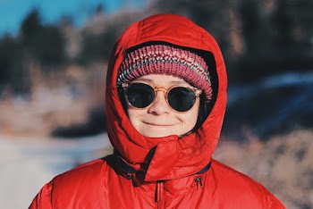 Woman Wearing Red Hooded Jacket