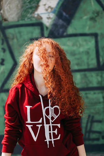Woman Wearing Red Hoodie
