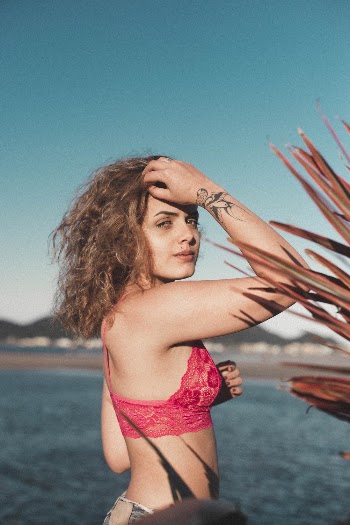 Woman Wearing Red Lace Bra