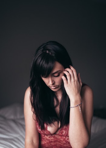 Woman Wearing Red Lace Top