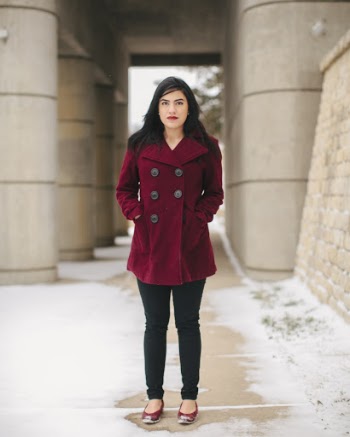 Woman Wearing Red Peacoat and Blue Denim Jeans
