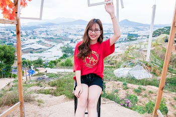 Woman Wearing Red Shirt and Black Shorts