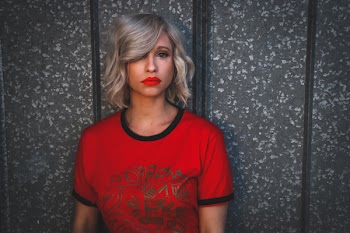 Woman Wearing Red Shirt With Red Lipstick