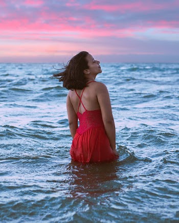 Woman Wearing Red Sleeveless Dress