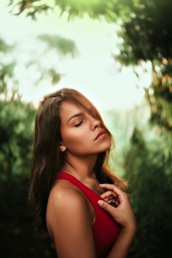 Woman Wearing Red Sleeveless Top