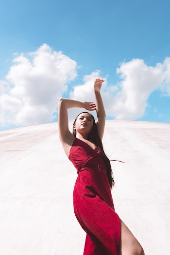 Woman Wearing Red Spaghetti Strap Dress