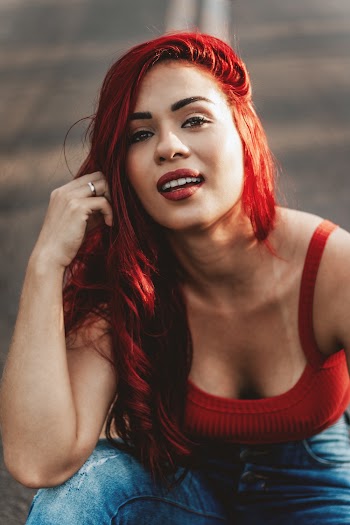 Woman Wearing Red Spaghetti Strap Top