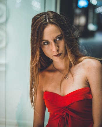 Woman Wearing Red Sweetheart Neckline Top