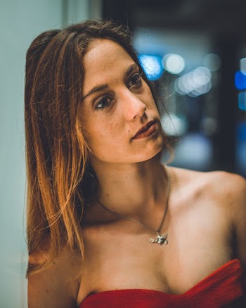 Woman Wearing Red Sweetheart Neckline Top