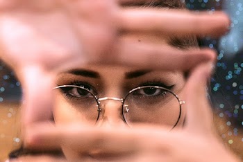 Woman Wearing Round Framed Eyeglasses