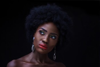 Woman Wearing Silver Chandelier Earrings