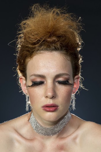 Woman Wearing Silver-colored Chokers