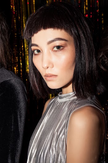 Woman Wearing Silver Dress