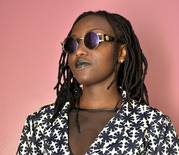 Woman Wearing Silver Framed Hippie Sunglasses
