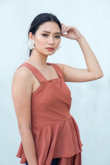 Woman Wearing Sleeveless Top