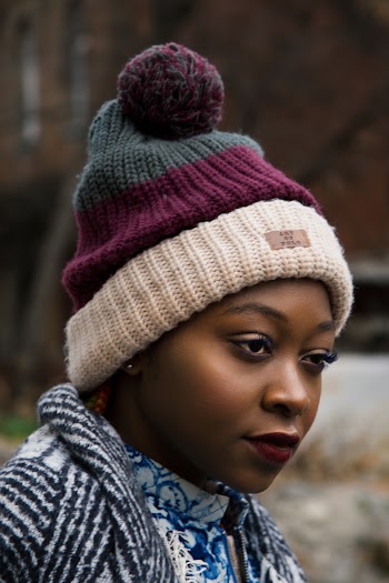 Woman Wearing Striped Bobble Hat