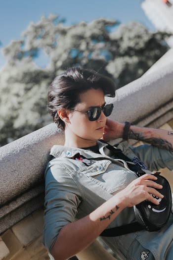 Woman Wearing Sunglasses and Gray Dress Shirt