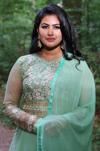 Woman Wearing Teal and White Floral Sari