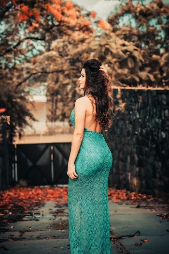 Woman Wearing Teal Dress