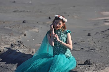 Woman Wearing Teal Gown