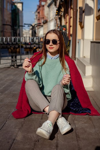 Woman Wearing Teal Knit Sweater