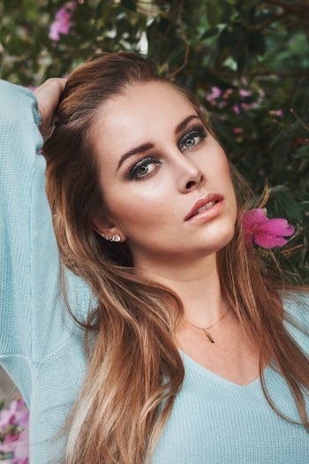 Woman Wearing Teal Long-sleeved Shirt