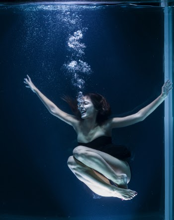 Woman Wearing Tube Dress Underwater