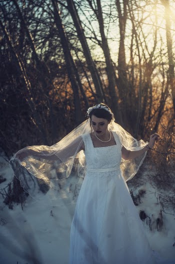 Woman Wearing Wedding Dress Walking Near Trees