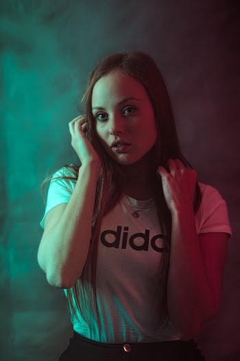 Woman Wearing White Adidas Shirt