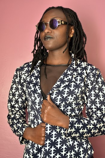 Woman Wearing White and Black Blazer