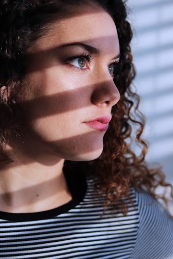 Woman Wearing White and Black Striped Crew-neck Shirt