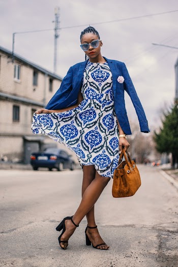 Woman Wearing White and Blue Dress