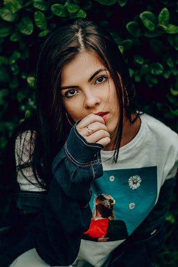 Woman Wearing White and Blue Shirt